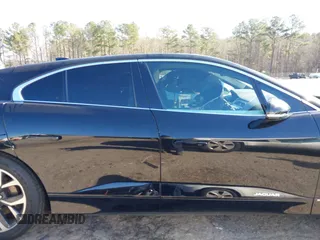 2020 Jaguar I-Pace SE with VIN SADHC2S12L1F87240, listed as a IAAI auction lot 41489254 with 58,359 mi miles and . Bid and sale history available at DreamBid. Image 14.