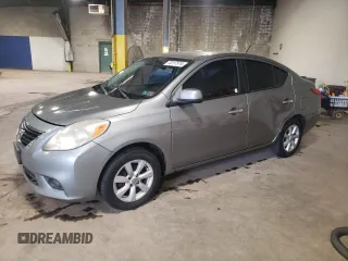 2012 Nissan Versa SV with VIN 3N1CN7AP1CL834615, listed as a Copart auction lot 72217574 with 131,340 mi miles and Salvage Title. Bid and sale history available at carsss.com. Image 1.