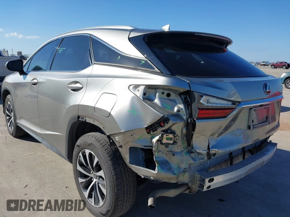 2020 Lexus RX with VIN 2T2AZMAA7LC173478, listed as a IAAI auction lot 41671494 with 91,777 mi miles. Bid and sale history available at carsss.com. Image 6.