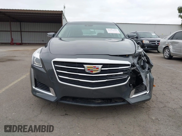 2016 Cadillac CTS Luxury Collection RWD z VIN 1G6AR5SX2G0144583, wystawiony jako IAAI lot #42194195 z przebiegiem 59 538 mil mil oraz . Historia ofert i sprzedaży dostępna na DreamBid. Obrazek 12.
