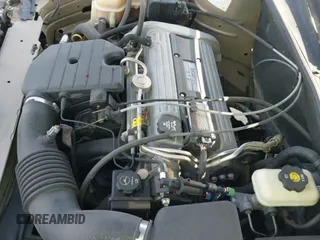 2004 Chevrolet Malibu Classic z VIN 1G1ND52F04M637230, wystawiony jako IAAI lot #40837935 z przebiegiem 56 072 mil mil oraz . Historia ofert i sprzedaży dostępna na DreamBid. Obrazek 19.