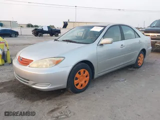 2002 Toyota Camry LE with VIN 4T1BE32K42U011553, listed as a IAAI auction lot 42054226 with 223,683 mi miles. Bid and sale history available at carsss.com. Image 2.