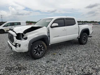 2022 Toyota Tacoma SR with VIN 3TMCZ5AN3NM479450, listed as a Copart auction lot 65319495 with 66,665 mi miles and Non repairable. Bid and sale history available at DreamBid. Image 1.
