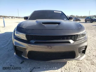 2023 Dodge Charger Scat Pack Widebody with VIN 2C3CDXGJ9PH651887, listed as a Copart auction lot 42554645 with 9,778 mi miles and Clean Title. Bid and sale history available at carsss.com. Image 5.