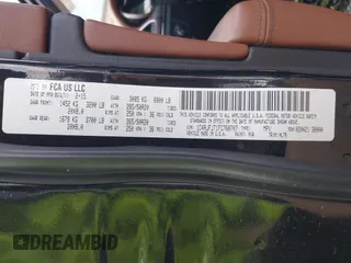 2015 Jeep Grand Cherokee Summit with VIN 1C4RJFJT1FC768707, listed as a IAAI auction lot 41863454 with 122,564 mi miles. Bid and sale history available at carsss.com. Image 9.