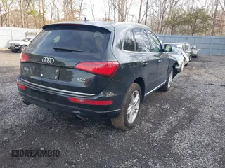 2016 Audi Q5 Premium Plus with VIN WA1L2AFP0GA026971, listed as a IAAI auction lot 41630172 with 98,077 mi miles. Bid and sale history available at carsss.com. Image 4.