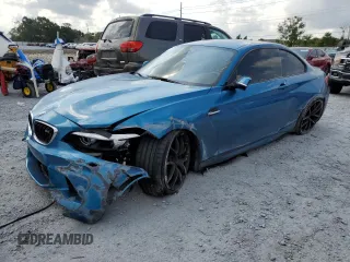 2018 BMW M2 z VIN WBS1J5C53JVD36649, wystawiony jako Copart lot #57961455 z przebiegiem 55 751 mil mil oraz Szkoda całkowita • Salvage title. Historia ofert i sprzedaży dostępna na DreamBid. Obrazek 1.