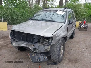 2001 Jeep Grand Cherokee Laredo z VIN 1J4GW48S01C658017, wystawiony jako IAAI lot #42160310 z przebiegiem 220 309 mil mil oraz . Historia ofert i sprzedaży dostępna na DreamBid. Obrazek 19.