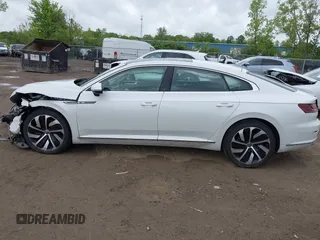 2021 Volkswagen Arteon SEL R-Line z VIN WVWSR7AN6ME007156, wystawiony jako IAAI lot #42254735 z przebiegiem 32 004 mil mil oraz . Historia ofert i sprzedaży dostępna na DreamBid. Obrazek 15.