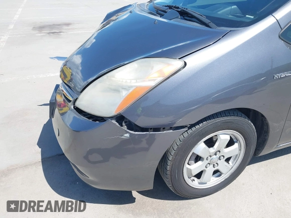 2007 Toyota Prius z VIN JTDKB20U273215633, wystawiony jako IAAI lot #41955538 z przebiegiem 172 957 mil mil oraz . Historia ofert i sprzedaży dostępna na DreamBid. Obrazek 17.