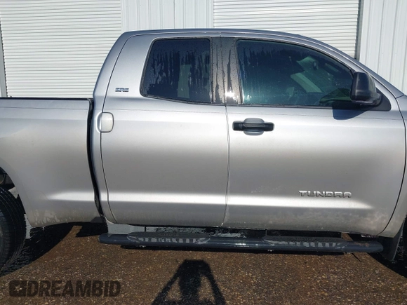 2014 Toyota Tundra SR with VIN 5TFRM5F13EX078411, listed as a IAAI auction lot 42702477 with 123,336 mi miles and . Bid and sale history available at DreamBid. Image 13.