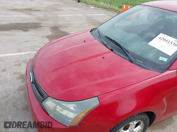 2009 Ford Focus SE with VIN 1FAHP32N79W238243, listed as a IAAI auction lot 42041530 with 191,620 mi miles. Bid and sale history available at carsss.com. Image 6.