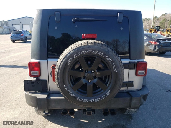 2013 Jeep Wrangler Unlimited Sport with VIN 1C4BJWDG7DL688230, listed as a Copart auction lot 48744865 with 142,110 mi miles and Clean Title. Bid and sale history available at carsss.com. Image 6.