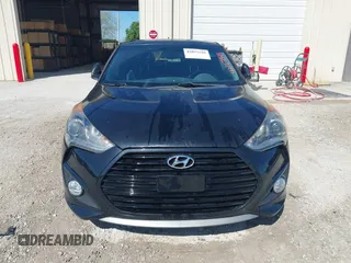 2013 Hyundai Veloster Turbo w/Black Int with VIN KMHTC6AE8DU175611, listed as a IAAI auction lot 42057549 with 137,929 mi miles. Bid and sale history available at carsss.com. Image 6.