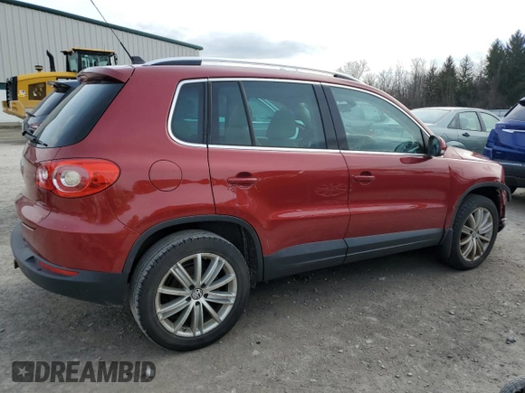 2011 Volkswagen Tiguan SE with VIN WVGBV7AX7BW001124, listed as a Copart auction lot 53044005 with 150,072 mi miles and Salvage Title. Bid and sale history available at DreamBid. Image 3.