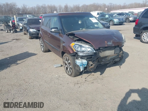 2012 Kia Soul + with VIN KNDJT2A6XC7422394, listed as a IAAI auction lot 41806315 with 165,268 mi miles. Bid and sale history available at carsss.com. Image 1.