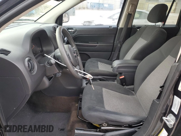 2015 Jeep Compass Sport with VIN 1C4NJCBB6FD111060, listed as a Copart auction lot 87246544 with 187,302 mi miles and Salvage Title. Bid and sale history available at carsss.com. Image 7.