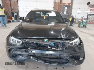 2020 BMW M2 Competition z VIN WBS2U7C09L7F85590, wystawiony jako IAAI lot #41836200 z przebiegiem 59 729 mil mil oraz . Historia ofert i sprzedaży dostępna na DreamBid. Obrazek 12.