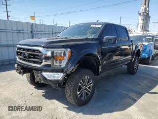 2021 Ford F-150 XL with VIN 1FTFW1E54MFD11453, listed as a Copart auction lot 50240015 with 8,645 mi miles and Salvage Title. Bid and sale history available at carsss.com. Image 1.