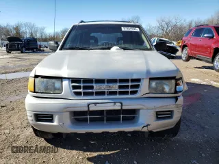 1999 Isuzu Rodeo S with VIN 4S2CK58WXX4373485, listed as a Copart auction lot 87804995 with 246,518 mi miles and Salvage title. Bid and sale history available at DreamBid. Image 5.