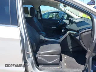 2013 Ford Escape SEL z VIN 1FMCU9H93DUA34811, wystawiony jako IAAI lot #42227559 z przebiegiem 126 495 mil mil oraz . Historia ofert i sprzedaży dostępna na DreamBid. Obrazek 5.