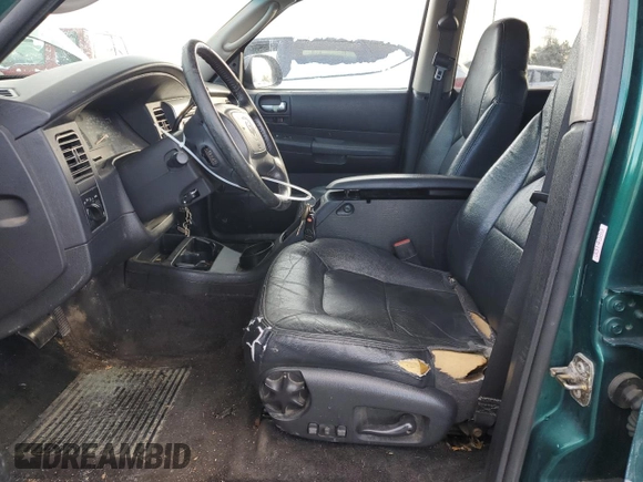 2003 Dodge Durango SLT Plus z VIN 1D4HS58N13F538012, wystawiony jako Copart lot #84553654 z przebiegiem 179 370 mil mil oraz Szkoda całkowita • Salvage title. Historia ofert i sprzedaży dostępna na DreamBid. Obrazek 7.