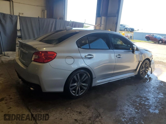 2017 Subaru WRX Premium z VIN JF1VA1E6XH9802803, wystawiony jako Copart lot #56047175 z przebiegiem 48 597 mil mil oraz Szkoda całkowita • Salvage title. Historia ofert i sprzedaży dostępna na DreamBid. Obrazek 3.