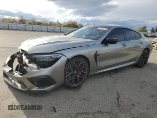2021 BMW M8 with VIN WBSGV0C01MCG45722, listed as a Copart auction lot 44418734 with 33,806 mi miles and Salvage Title. Bid and sale history available at carsss.com. Image 1.