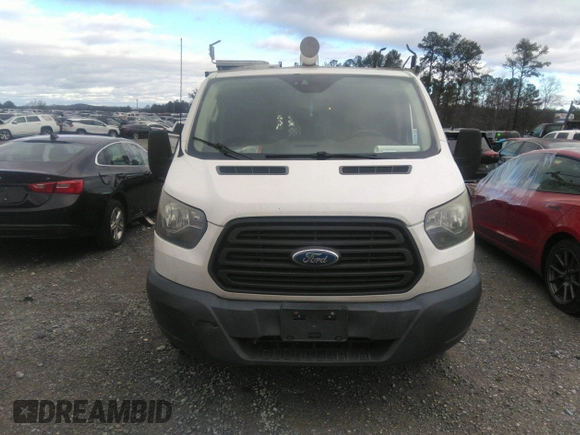 2016 Ford Transit Cargo with VIN 1FTYR1ZM7GKA14464, listed as a IAAI auction lot 41230405 with 120,604 mi miles and . Bid and sale history available at DreamBid. Image 12.