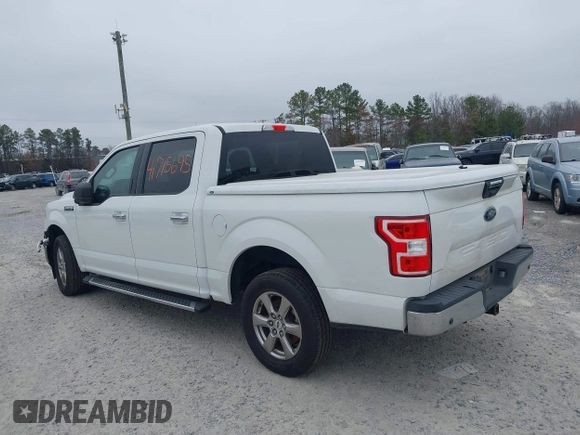 2020 Ford F-150 XL with VIN 1FTEW1C51LFB75537, listed as a IAAI auction lot 41715695 with 76,585 mi miles. Bid and sale history available at carsss.com. Image 3.