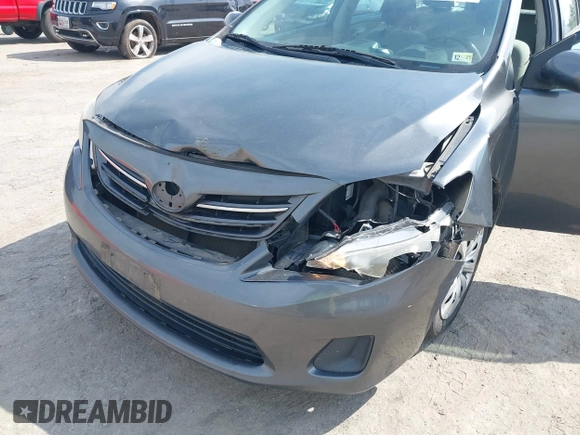 2013 Toyota Corolla L with VIN 2T1BU4EE7DC100830, listed as a IAAI auction lot 42032150 with 205,914 mi miles. Bid and sale history available at carsss.com. Image 6.