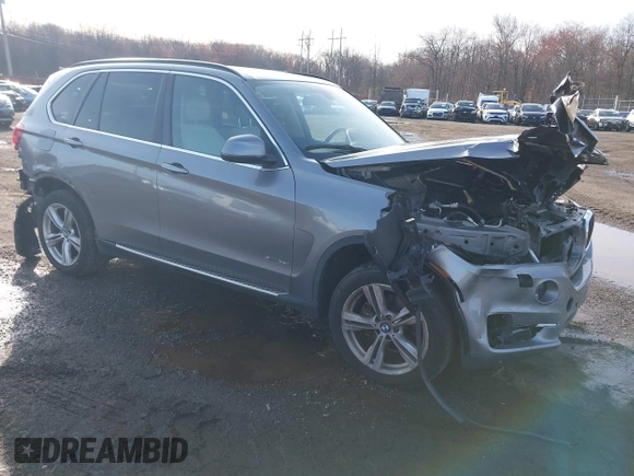 2014 BMW X5 xDrive35i z VIN 5UXKR0C52E0H19670, wystawiony jako IAAI lot #41909590 z przebiegiem 137 758 mil mil oraz . Historia ofert i sprzedaży dostępna na DreamBid. Obrazek 1.