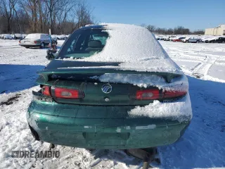 1999 Mercury Sable LS z VIN 1MEFM53S7XA603362, wystawiony jako Copart lot #88292545 z przebiegiem 93 776 mil mil oraz Nie do naprawy. Historia ofert i sprzedaży dostępna na DreamBid. Obrazek 6.