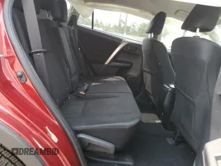 2018 Toyota RAV4 LE with VIN JTMBFREV2JD233808, listed as a Copart auction lot 59021235 with 71,430 mi miles and Salvage title. Bid and sale history available at DreamBid. Image 11.