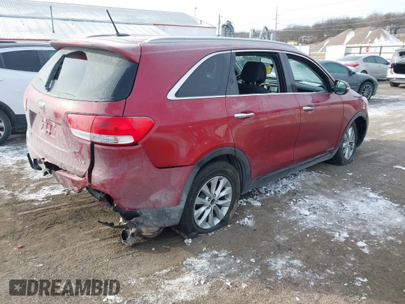 2016 Kia Sorento LX with VIN 5XYPGDA5XGG180698, listed as a IAAI auction lot 41417694 with 84,229 mi miles. Bid and sale history available at carsss.com. Image 4.