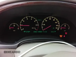 2000 Cadillac DeVille DTS z VIN 1G6KF5794YU249059, wystawiony jako Copart lot #71614494 z przebiegiem 121 611 mil mil oraz Szkoda całkowita • Salvage title. Historia ofert i sprzedaży dostępna na DreamBid. Obrazek 9.