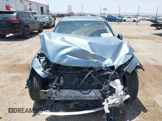 2015 Infiniti Q50 z VIN JN1BV7AP2FM357716, wystawiony jako IAAI lot #42504273 z przebiegiem 74 608 mil mil oraz . Historia ofert i sprzedaży dostępna na DreamBid. Obrazek 13.