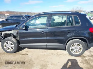 2017 Volkswagen Tiguan S with VIN WVGAV7AX6HK016922, listed as a IAAI auction lot 42032319 with 104,358 mi miles and . Bid and sale history available at DreamBid. Image 14.
