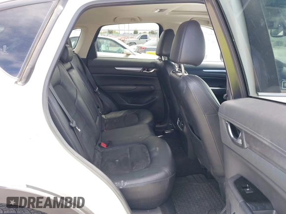2018 Mazda CX-5 Touring with VIN JM3KFACM3J0381122, listed as a IAAI auction lot 42023838 with 76,121 mi miles. Bid and sale history available at carsss.com. Image 8.