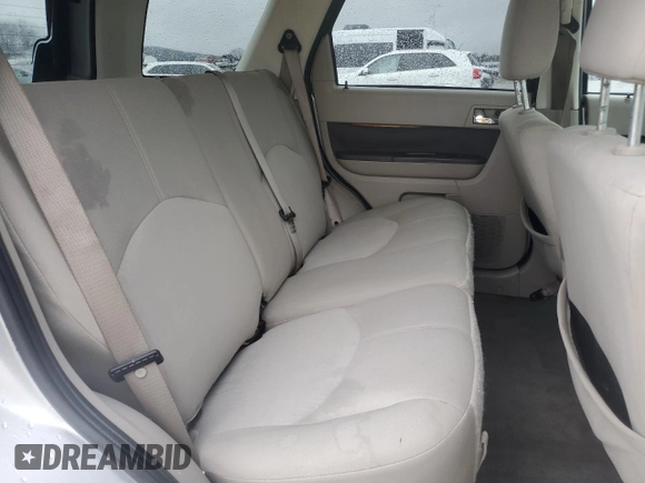 2009 Mercury Mariner with VIN 4M2CU91709KJ00211, listed as a Copart auction lot 85007594 with 111,797 mi miles and Salvage Title. Bid and sale history available at carsss.com. Image 11.