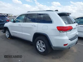 2014 Jeep Grand Cherokee Laredo with VIN 1C4RJEAG3EC125478, listed as a IAAI auction lot 41938499 with 167,588 mi miles and . Bid and sale history available at DreamBid. Image 3.