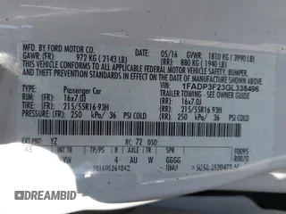 2016 Ford Focus SE z VIN 1FADP3F23GL338496, wystawiony jako IAAI lot #42333608 z przebiegiem 76 972 mil mil oraz . Historia ofert i sprzedaży dostępna na DreamBid. Obrazek 9.