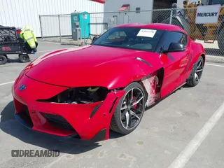 2022 Toyota Supra 3.0 with VIN WZ1DB0C05NW050860, listed as a IAAI auction lot 42093290 with 29,726 mi miles and . Bid and sale history available at DreamBid. Image 2.