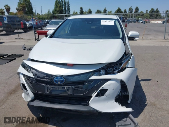 2021 Toyota Prius LE z VIN JTDKAMFP3M3187644, wystawiony jako IAAI lot #42443171 z przebiegiem 126 977 mil mil oraz . Historia ofert i sprzedaży dostępna na DreamBid. Obrazek 11.
