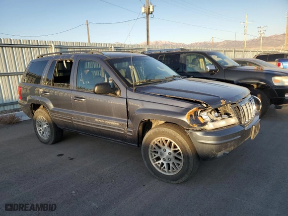 2003 Jeep Grand Cherokee Limited with VIN 1J4GW58N03C561385, listed as a Copart auction lot 75777094 with 169,705 mi miles and Salvage Title. Bid and sale history available at carsss.com. Image 4.