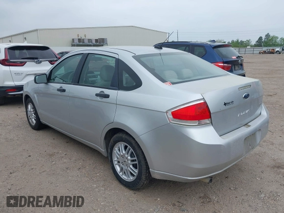 2010 Ford Focus SE with VIN 1FAHP3FN7AW290356, listed as a IAAI auction lot 41915359 with 60,027 mi miles. Bid and sale history available at carsss.com. Image 3.