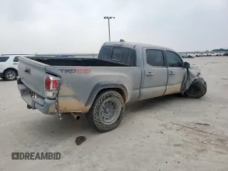 2021 Toyota Tacoma SR5 with VIN 3TMDZ5BN4MM105639, listed as a Copart auction lot 56948395 with Not provided miles and Salvage title. Bid and sale history available at DreamBid. Image 3.