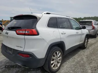 2014 Jeep Cherokee Limited with VIN 1C4PJLDB1EW301647, listed as a Copart auction lot 56169585 with 140,784 mi miles and Salvage title. Bid and sale history available at DreamBid. Image 3.