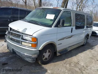 1999 Chevrolet Express Van with VIN 1GBFG15RXX1047502, listed as a IAAI auction lot 41379918 with 101,936 mi miles. Bid and sale history available at carsss.com. Image 2.