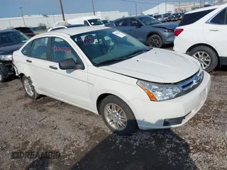 2009 Ford Focus SE z VIN 1FAHP35N79W235743, wystawiony jako IAAI lot #42086256 z przebiegiem 95 986 mil mil oraz . Historia ofert i sprzedaży dostępna na DreamBid. Obrazek 1.